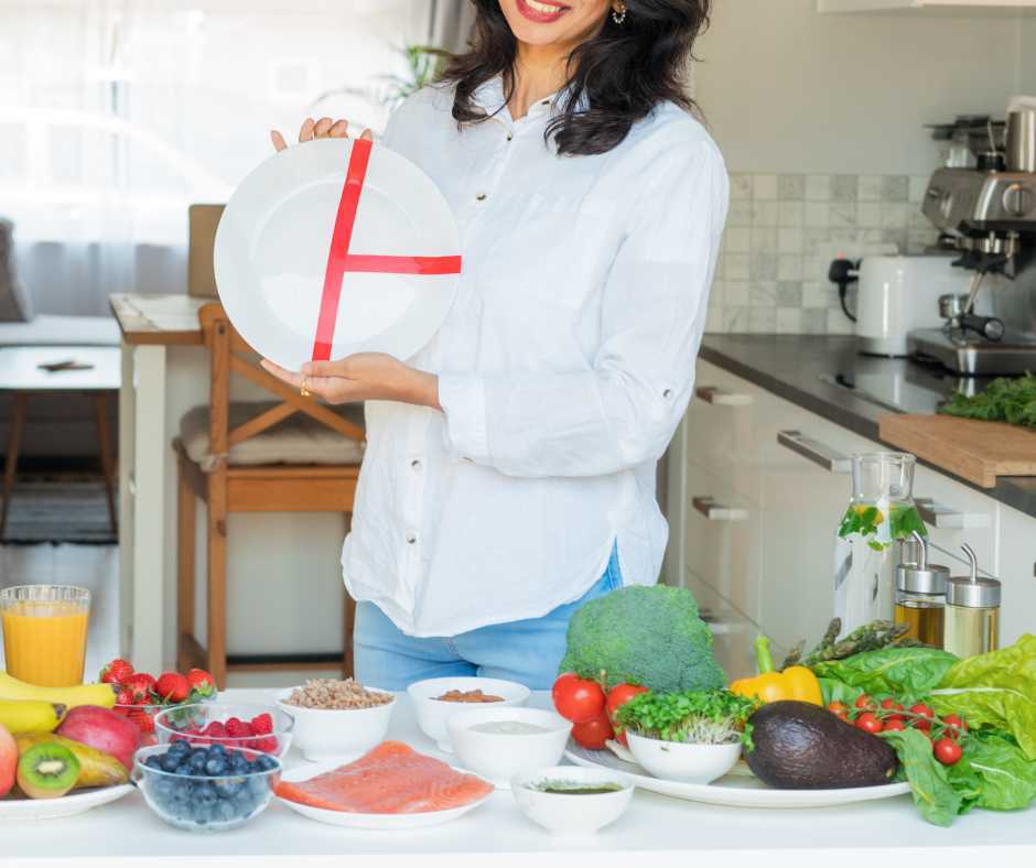 women showing a balanced plate