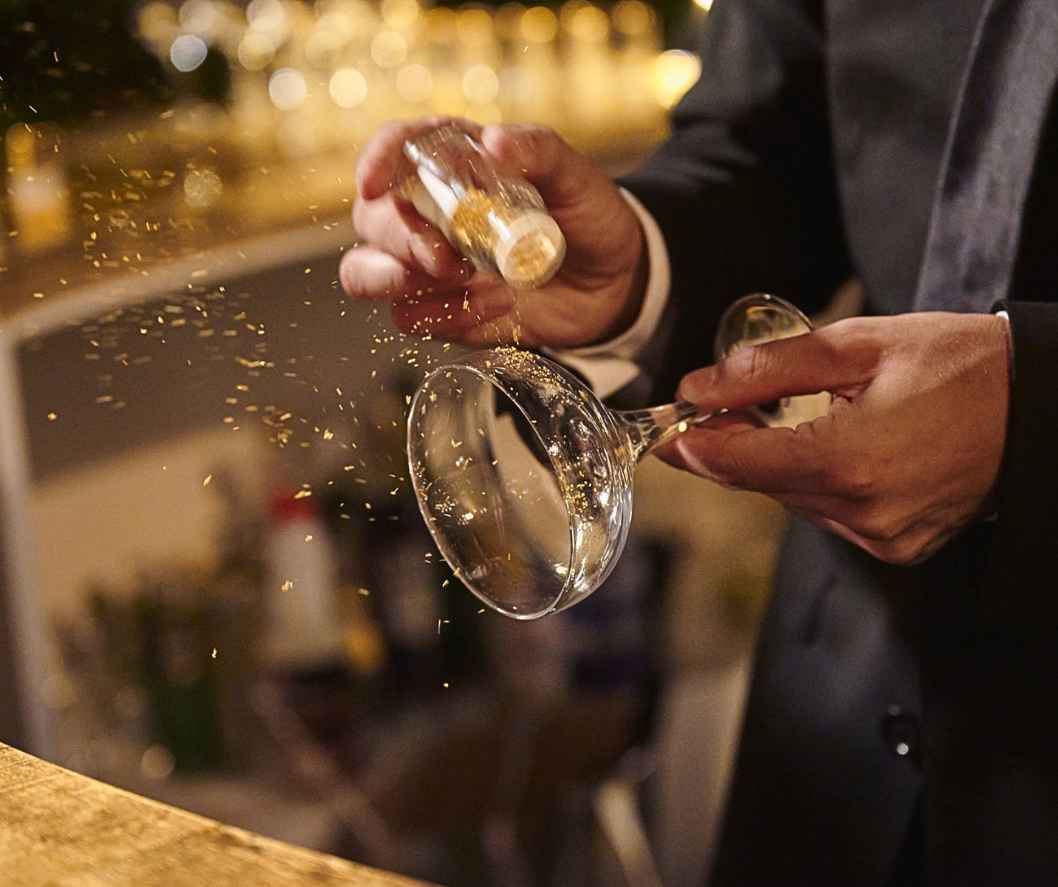 golden cocktail being made