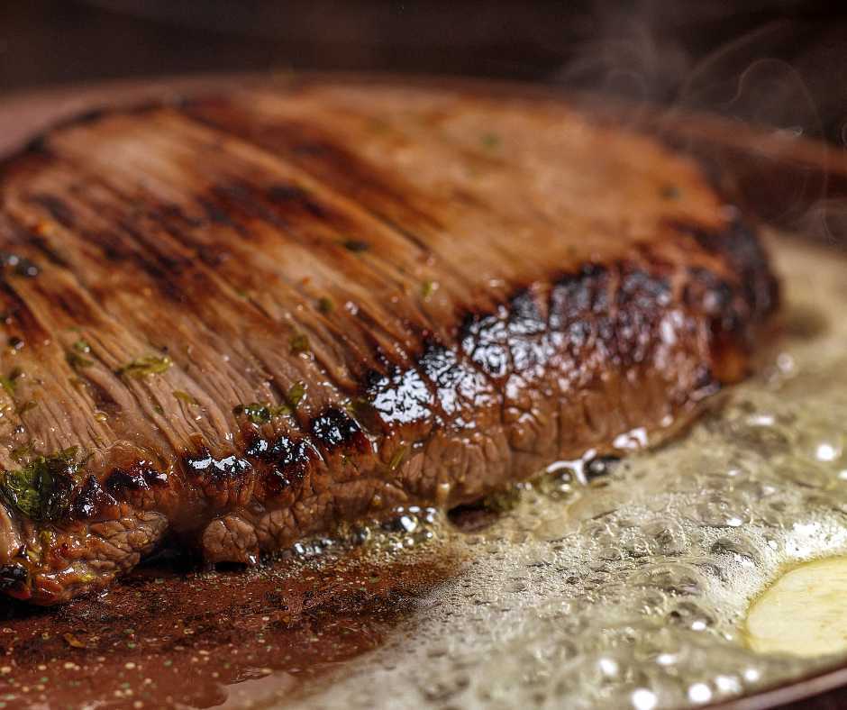 cooking steak with butter