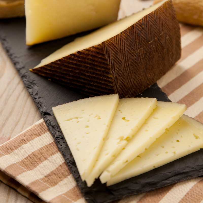 table with manchego cheese